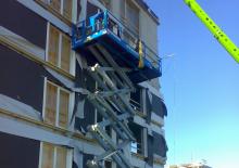 Plataformas de tijeras de ruedas Holland-Lift HL-190 E20 RT