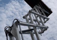 Plataformas de tijeras de ruedas Holland-Lift HL-340 E30 RT