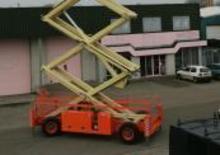 Plataformas de tijeras de ruedas Holland-Lift G 320 DL 30 4WD S/N